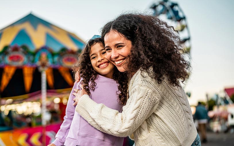 mom and child at a carnival 