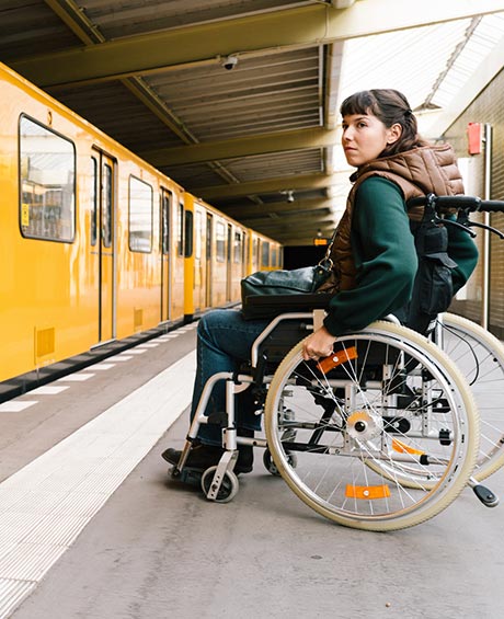 woman waiting to get on train