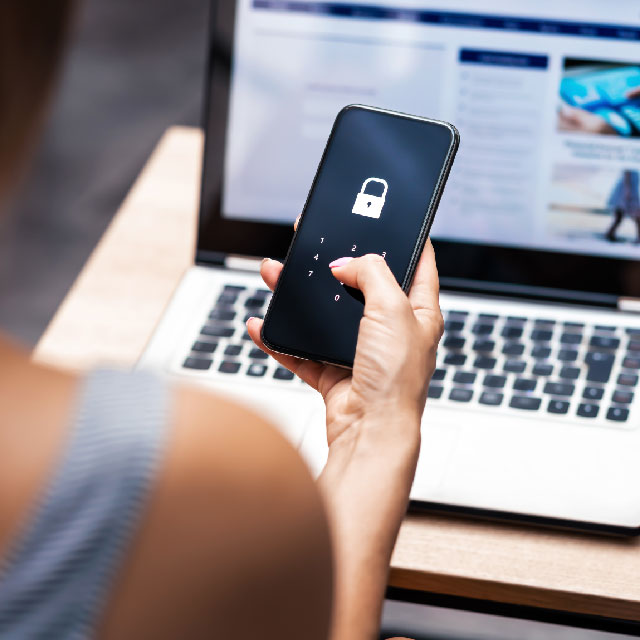 Person looking at their locked phone screen