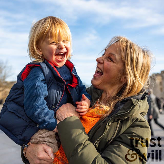 Grandma and grandson outdoors.