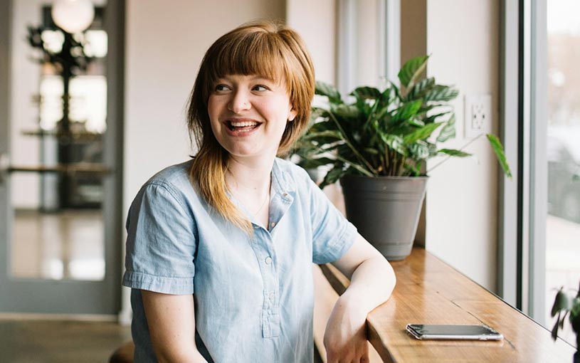 woman sitting by window