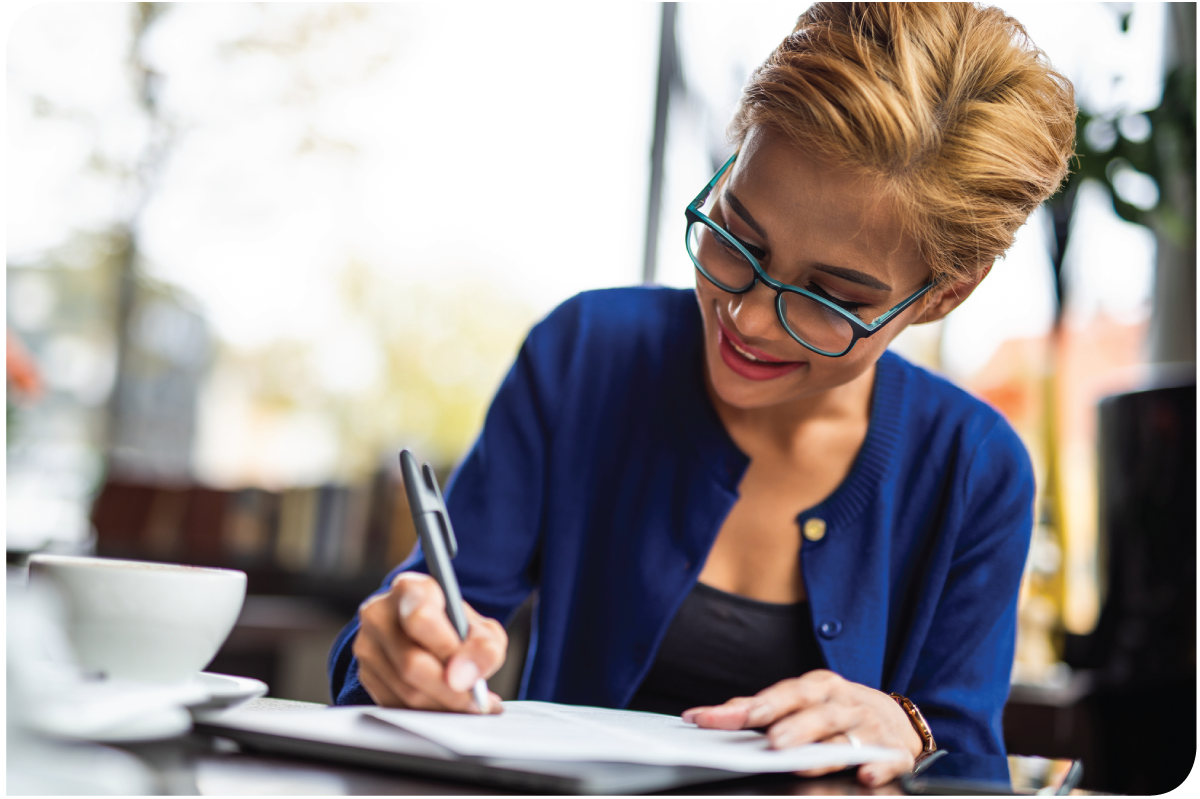 Woman writing a check