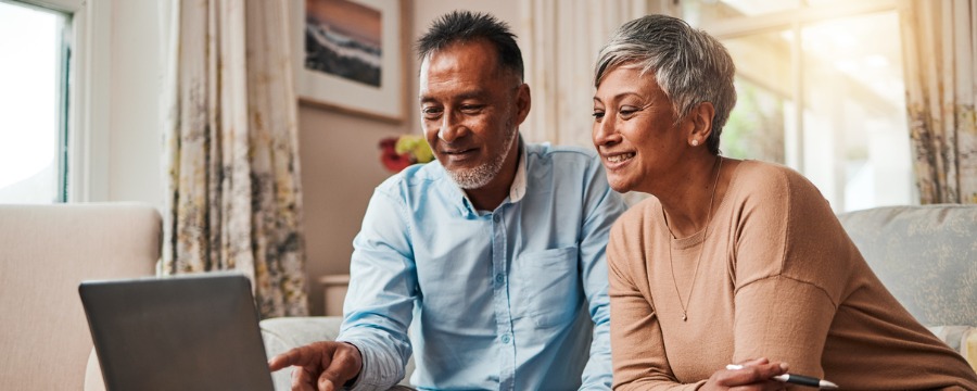 A couple looking at a computer