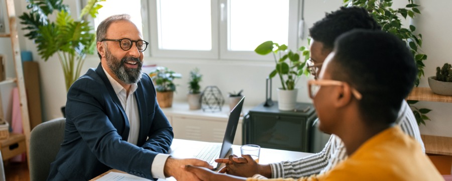 Wire Transfer man and woman meeting with a professional